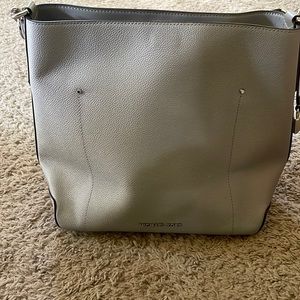 Gray leather MK purse.